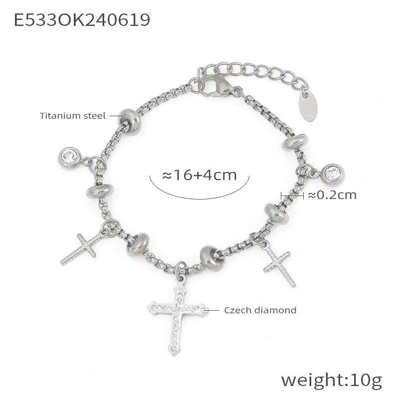 Pulsera de acero 304 con baño de oro 18K y dijes de cruz, estrella y corazón - imagen 10