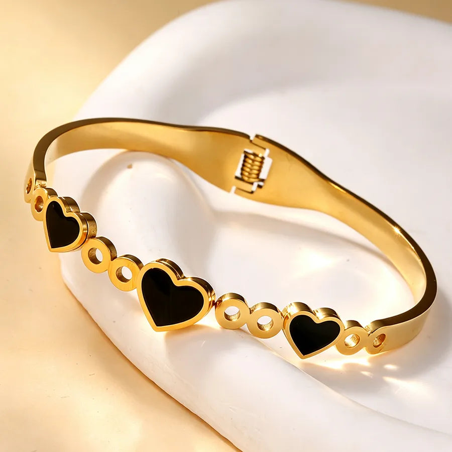 Brazalete asimétrico de acero 304 con diseño de corazón para mujer - imagen 5