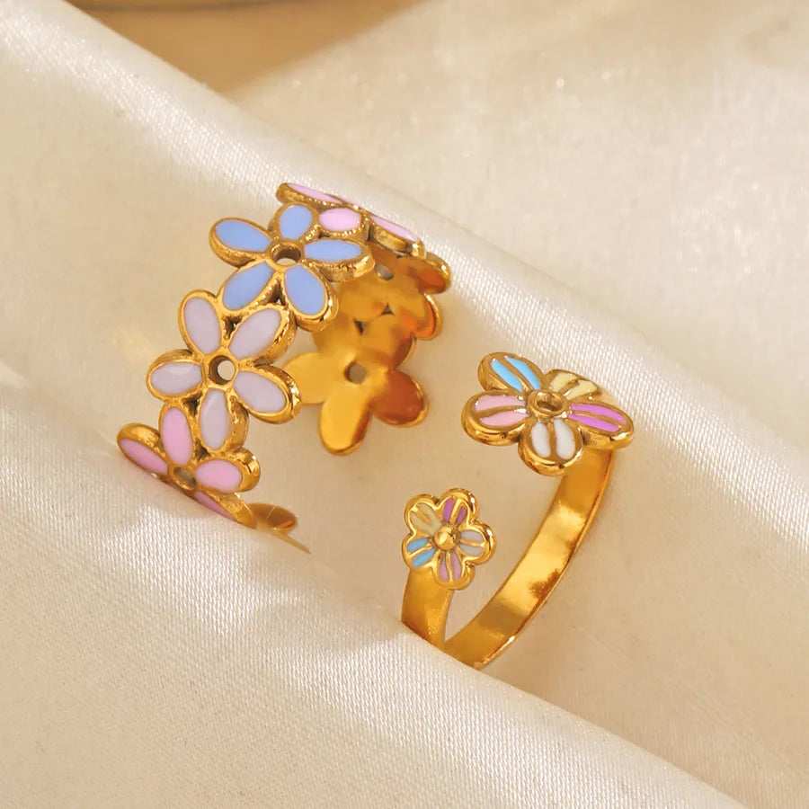 Anillo ajustable de acero 304 con baño de oro 18K, flor y resina - imagen 2