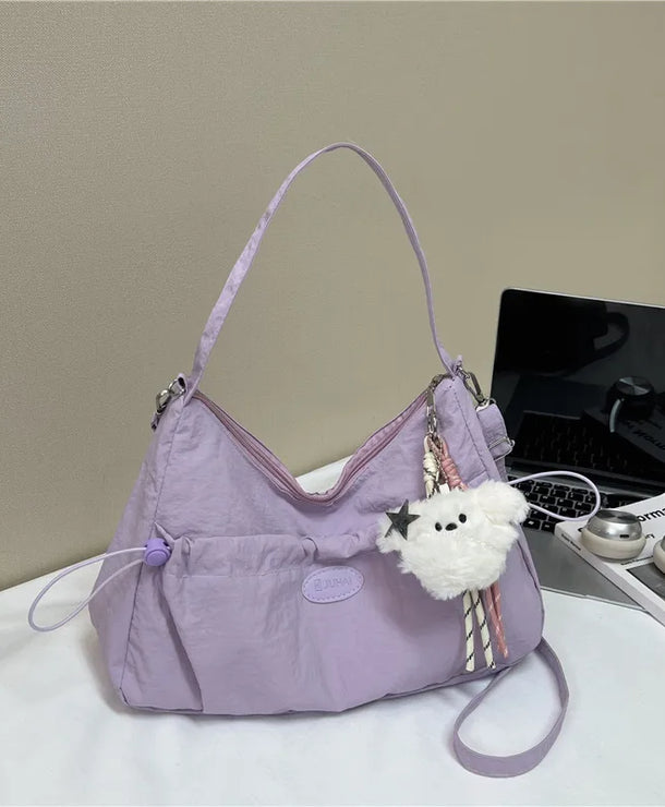 Bolso cruzado forma dumpling para mujer en nylon con pliegues - imagen 9