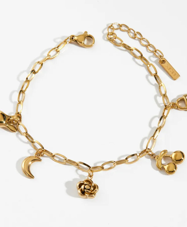 Pulsera de flores de cereza con baño de oro y circonias en acero 304 - imagen 6