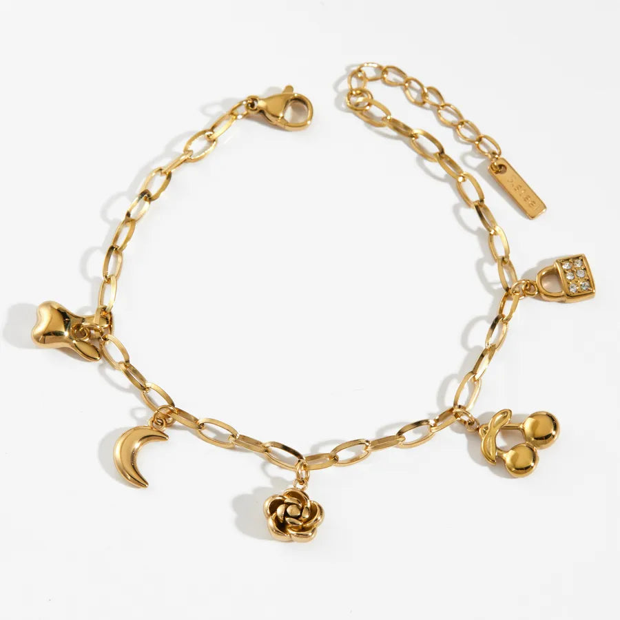 Pulsera de flores de cereza con baño de oro y circonias en acero 304 - imagen 6