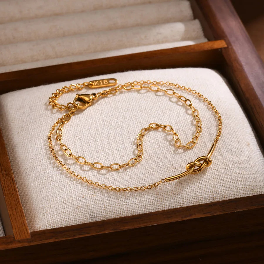 Pulsera con diseño de nudo en acero 201 y baño de oro 18K - imagen 6