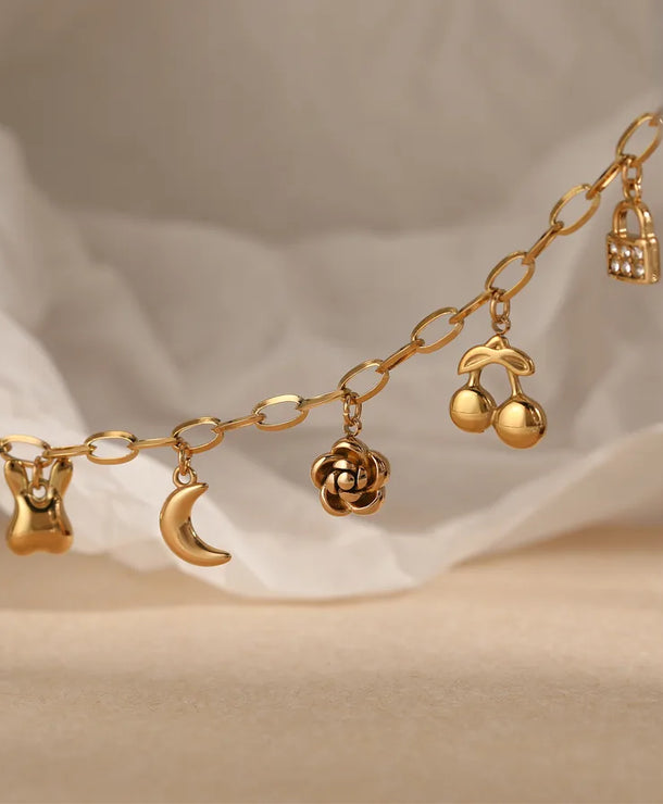 Pulsera de flores de cereza con baño de oro y circonias en acero 304 - imagen 4