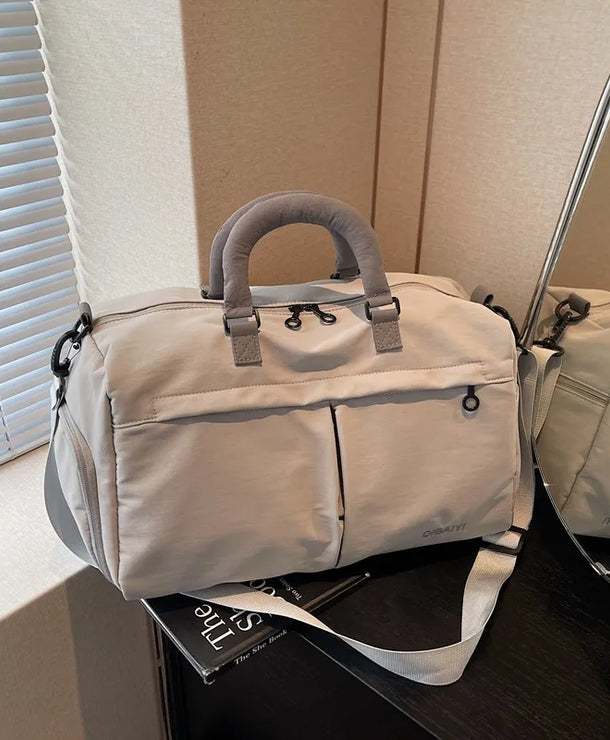 Bolso de viaje impermeable de tela Oxford en color liso, amplio y resistente