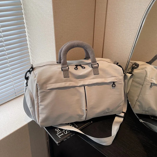 Bolso de viaje impermeable de tela Oxford en color liso, amplio y resistente