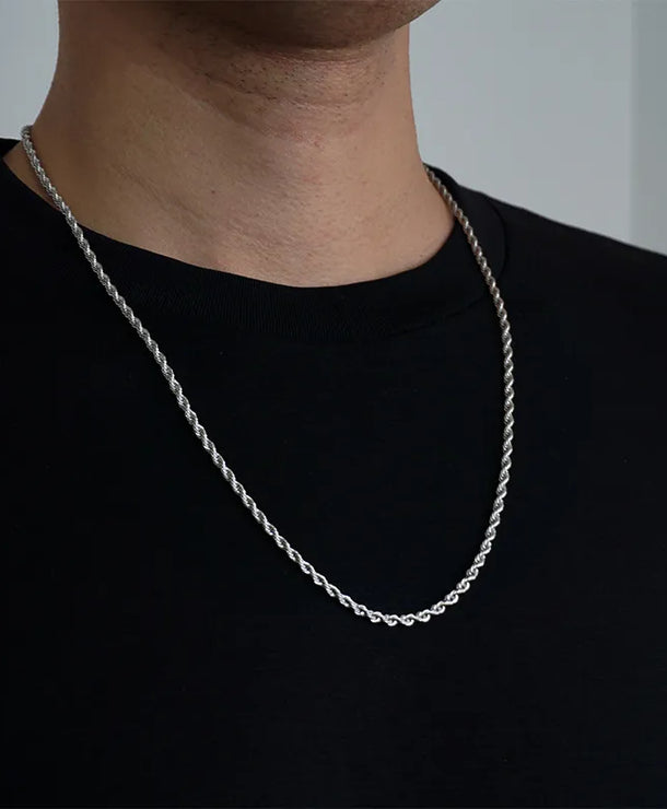 Collar con dije de espiral geométrico en acero de titanio - imagen 2