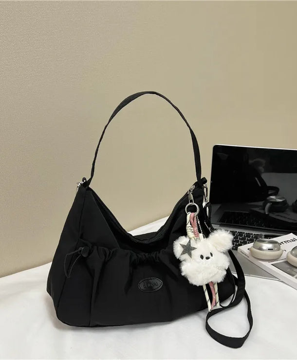 Bolso cruzado forma dumpling para mujer en nylon con pliegues - imagen 6