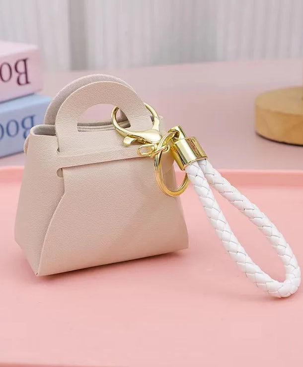 Monedero estilo macaron para monedas y audífonos, diseño kawaii - imagen 10